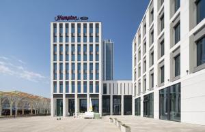 a rendering of the front of a building at Hampton by Hilton Łódź City Center in Łódź