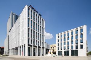 a rendering of the front of a building at Hampton by Hilton Łódź City Center in Łódź