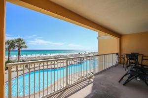 a balcony with a view of a pool and the beach at 3BR Beachfront Huge Balcony 2 Pools Luxury in Fort Walton Beach