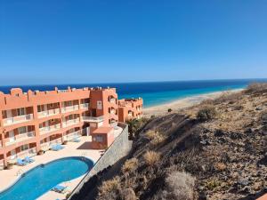 a view of the hotel and the beach at Paraíso Jandia beach in Costa Calma