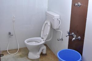 Koupelna v ubytování Arunaachalaa Inn
