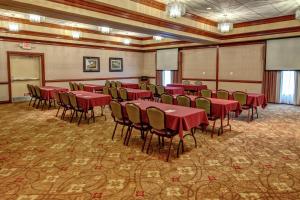 a conference room with red tables and chairs at Hampton Inn Winchester KY in Winchester