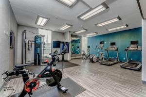 a gym with a treadmill and a exercise bike at Hampton Inn Morgantown in Morgantown