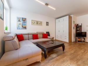a living room with a couch and a coffee table at Selmas in Zell am See