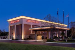 a hotel front of a building at night at Hampton Inn South Hill in South Hill