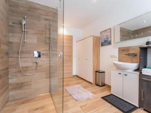 a bathroom with a shower and a sink at Smaragdherz in Brandberg +24 photos