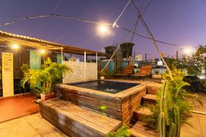 a hot tub on the roof of a house at Casa La Bella Samaria Boutique in Santa Marta