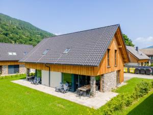 an aerial view of a house with a slate roof at Mountain Chalet Aquarius 5A in Sankt Lorenzen ob Murau
