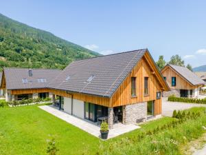 an image of a home with a metal roof at Mountain Chalet Esttes in Sankt Lorenzen ob Murau