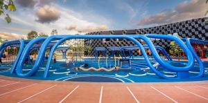 a large playground with a blue water slide at Pacific Palms Retreat - Entire Home in Plumpton Sleeps 9 - 8-Car Parking Near Eastern Creek in Rooty Hill