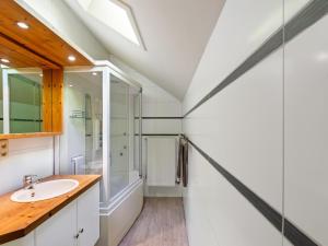 a bathroom with a sink and a shower at Quanto A B in Geetbets +74 photos
