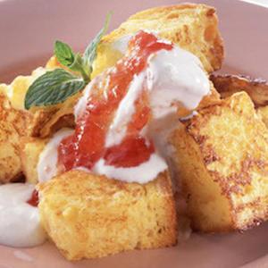 a piece of food with cream and sauce on a plate at Hotel VILLA ANNEX盛岡 in Morioka +21 photos