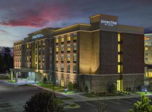 a rendering of the exterior of a hotel at DoubleTree by Hilton Raleigh-Cary in Cary
