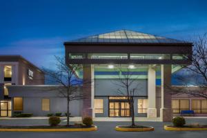 a building with a glass dome on top of it at Garner Hotel Brockton - Boston by IHG in Brockton