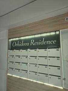 a sign that reads outbreak collagen resilience on a garage door at Sunny Apartment in Oradea +16 photos