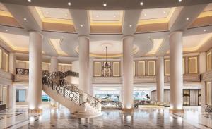 a lobby with a staircase in a building at Hilton Tokyo Odaiba in Tokyo