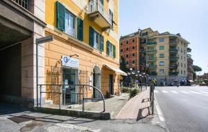a building on the side of a city street at Casa Garibotti in Recco