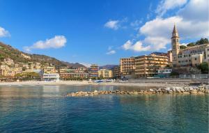 acean view of a city with a beach and buildings at Casa Garibotti in Recco +11 photos