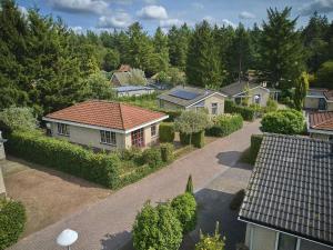 an overhead view of a house with a driveway at Heidepracht in Putten