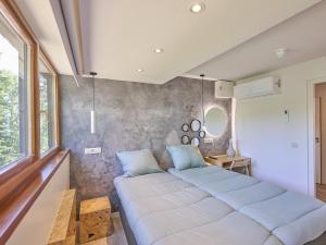 a living room with two beds in a room at Silt in Schinnen