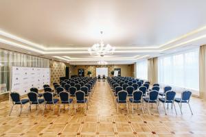 a large room with chairs and a stage in it at Vozdvizhenskoe Park Hotel in Serpukhov +37 photos