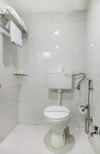 Koupelna v ubytování Hotel Raya Inn