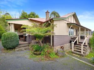 a house with a tree in front of it at The Gables in Marysville