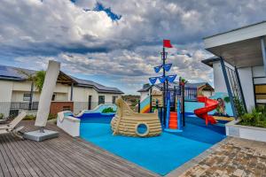 a playground at a resort with a slide at Ballito Hills 171 in Ballito