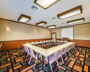 a conference room with a large table and chairs at Econo Lodge Inn & Suites Eagle Pass in Eagle Pass