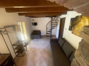 a view of a room with stairs in a building at La villetta tra ulivi e colline in Civezza