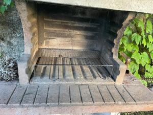 a set of concrete stairs with a metal railing at La villetta tra ulivi e colline in Civezza