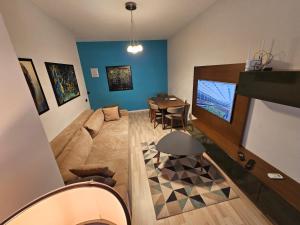 a living room with a couch and a table at central apart in Tirana