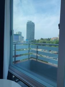 a window with a view of a city skyline at Y2 Stay Hotel in Sokcho