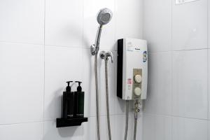 a shower in the corner of a bathroom at Terminal2 Hotel Phukettown in Phuket +38 photos