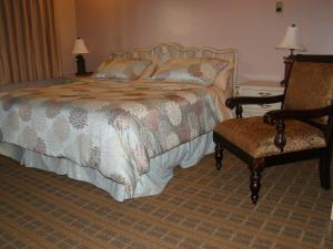 En eller flere senge i et værelse på King's Motel & Restaurant