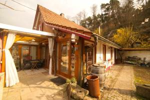 a house being remodeled with a patio in front of it at Haus im Rübental in Bad Dürkheim