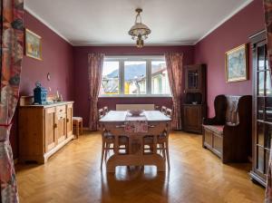 a dining room with a table and a window at JS10 - 2BR Central Bergen Views in Bergen