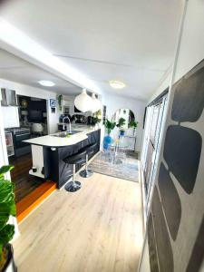 a kitchen with a sink and a counter top at Eleda House Hunter Valley in Cessnock +24 photos