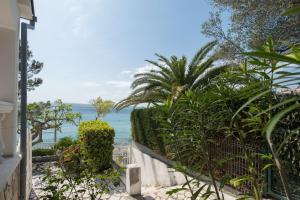 a view of the ocean from a house at Apartment Lemon & Soul in Selce