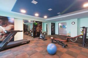 a room with a gym with a blue ball in it at The Grand Anukampa in Jaipur