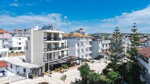 an aerial view of a city with buildings at Hotel Parid in Ksamil