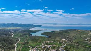 an aerial view of a river and a city at Hotel Parid in Ksamil