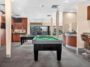 a billiard room with two pool tables in it at BreakFree Wirrina Cove in Wirrina Cove