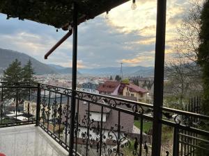a view of a city from a balcony at Karmia Boutique in Piatra Neamţ