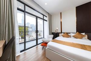 a hotel room with a bed and a large window at HomeAi Apartment - Binh Thanh near Landmark 81 in Ho Chi Minh City