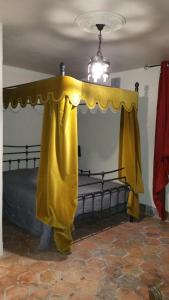 Postel nebo postele na pokoji v ubytování Château des Aiguilles