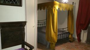 Postel nebo postele na pokoji v ubytování Château des Aiguilles