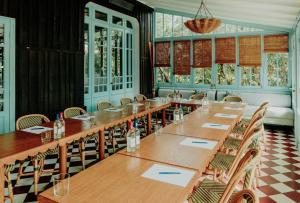 a large room with a long table and chairs at La Maison du Bassin in Cap-Ferret +60 photos