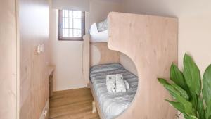 a room with a bunk bed in a room at Villa Infinity Torrox by Ruralidays in Torrox