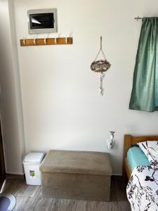 a small room with a bed and a bed at Casa Borgo in Bale +1 photo